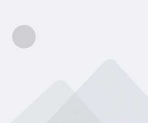 Placeholder image with a gray background, a circle representing the sun, and two overlapping triangles symbolizing mountains.