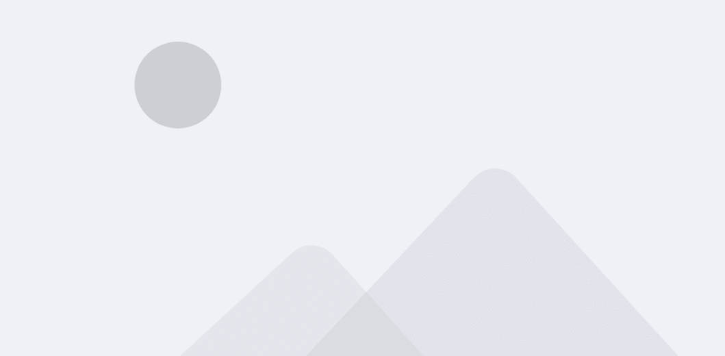 Placeholder image with a gray background, a circle representing the sun, and two overlapping triangles symbolizing mountains.